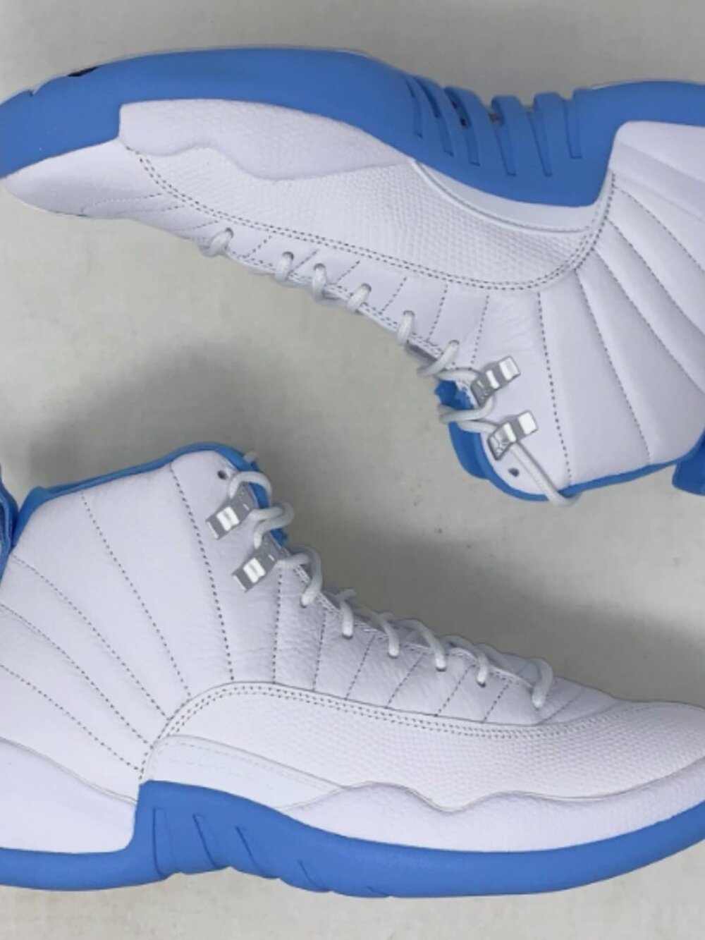Air Jordan 12 'Melo UNC University Blue' White Sneakers